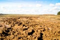 Impassable dirt and blue sky on the horizon