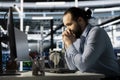 Impatient engineer in data center waiting for software to update Royalty Free Stock Photo
