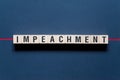 Impeachment word concept on cubes