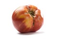 Imperfect red ripe organic tomato isolated Royalty Free Stock Photo