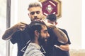 Professional barber who cuts beard and hair