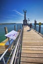 Imperia statue in harbor of Konstanz city with a view to lake Constance. Konstanz is a city located in the south-west corner of G Royalty Free Stock Photo