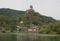 Perched high on the hill over the Moselle River in the picturesque town of Cochem is the beautiful Reichsburg Cochem Castle. Royalty Free Stock Photo