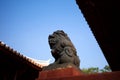 Imperial guardian lion against blue sky Royalty Free Stock Photo