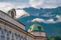 Imperial Palace Hofburg in Innsbruck, Austria. Nordkette mountain range with Seegrube and Hafelekar cablecar stations