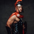 Imperial roman warrior with armour looking at camera