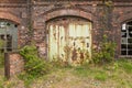 The Imperial Shipyard Trail - high gate of abandoned destroyed hall. Gdansk, Poland