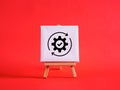Implementation process optimization with gear and check mark on canvas Royalty Free Stock Photo