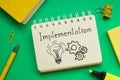 Implementation is shown on the photo using the text