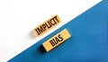 Implicit bias symbol. Concept words Implicit bias on wooden block. Beautiful white and blue table white and blue background.