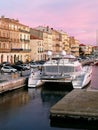 Imponing Luxury white yacht on a canal on sunrise to SÃÂ¨te in France. Royalty Free Stock Photo