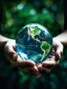 importance of ecology and environmental conservation, with hands tenderly cradling a green Earth globe