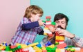 Importance of playing together. Dad and son have fun. Childish cheerful dad and funny son. Dad play toys with kid. Dad Royalty Free Stock Photo