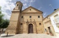 Important church in Baeza of Romanesque style called Trinitarios Descalzos with blue sky. Baeza. Royalty Free Stock Photo