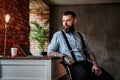 Portrait of bearded man with tattoes on his arms Royalty Free Stock Photo