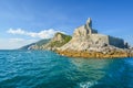 The imposing Church of St. Peter and the Doria Castle on the rocky peninsula at the entrance to Porto Venere Italy