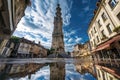 Imposing tower, life in the streets around it., generative IA Royalty Free Stock Photo