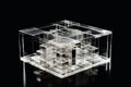 An impossible geometric puzzle made of glass created with generative AI technology