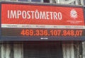 Impostometro banner, a real time score of how much money Brazilian people pay in taxes.