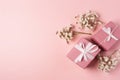 Impress your loved ones with these lovely spring gift ideas! Featuring a top view photo of pink gift boxes with bows