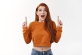 Impressed speechless attractive stylish redhead urban girl redhead ginger haircut show belly cropped top drop jaw