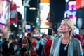 Impressed Woman in the Middle of Times Square Royalty Free Stock Photo