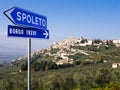 Trevi historical center with road sign in foreground, Umbria, Italy Royalty Free Stock Photo