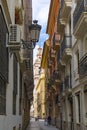 Impression of a narrow street near Calle Calatrava in Valencia, Spain