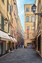 Impression of the narrow street Via Palazzo in the center of the Italian town San Remo