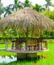 Impressionism photography scene of outdoor thatched hut restaurant in Southeast Asia