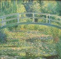 Impressionist painting of bridge over waterlilies by french painter Claude Monet