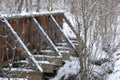 Impressionistic Style Artwork of a Snow Covered Bridge Winter Forest