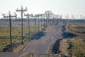 Impressionistic Style Artwork of Utility Poles Standing Beside the Desert Road Royalty Free Stock Photo