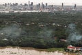 An impressive aerial top view of skyscrapers at downtown Bangkok city along the chao phraya river in morning fog. No focus, Royalty Free Stock Photo