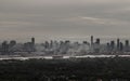 An impressive aerial top view of skyscrapers at downtown Bangkok city along the chao phraya river in morning fog Royalty Free Stock Photo