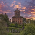 Impressive Ancient Glasgow architecture looking over to the Nocropolis sitting high on the cemetery hill at the sunset end of the Royalty Free Stock Photo