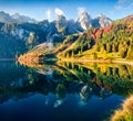 Impressive autumn scene of Vorderer Gosausee lake. Picturesque morning view of Austrian Alps, Upper Austria, Europe.