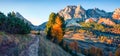 Impressive autumn view from the top of Falzarego pass with Lagazuoi mountain range. Colorful morning scene of Dolomite Alps, Royalty Free Stock Photo