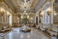 The impressive ballroom of the Museo Nacional de Ceramica in Valencia, with beautifully decorated sofas and crystal chandeliers, S Royalty Free Stock Photo