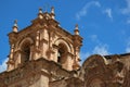 Impressive bell tower of Puno Cathedral against blue sky, Puno, Peru