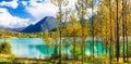 Beautiful autumn landscape with turquoise lake Lago di Castel Sa Royalty Free Stock Photo