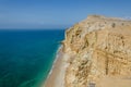 Impressive cliffs with turquoise ocean at the coast at Caotinha, Angola Royalty Free Stock Photo