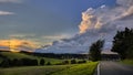 Impressive clouds with an orange evening sky after a thunderstorm. Royalty Free Stock Photo