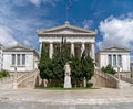 Impressive curved marble stairs and neo-classical facade of the natiomal library of Athens, Greece.