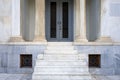 Impressive entrance with marble columns, classical architecture building detail