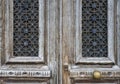 Impressive entrance, wooden weathered brown door, classical architecture building detail