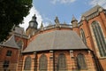 The impressive external facade of Saint Walburgiskerk church with turrets and the bell tower in Zutphen