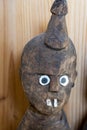 An impressive face portrÃ¤t of a carved wooden sculpture, handcrafted by the tribe of Konso in Etiopia Royalty Free Stock Photo