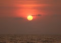 Impressive golden sun on red color gradation sky over gulf of Thailand