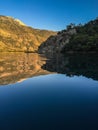 Impressive ladnscape of mountain and mountain reflection on sea, Fethiye, Mugla, Turkey Royalty Free Stock Photo